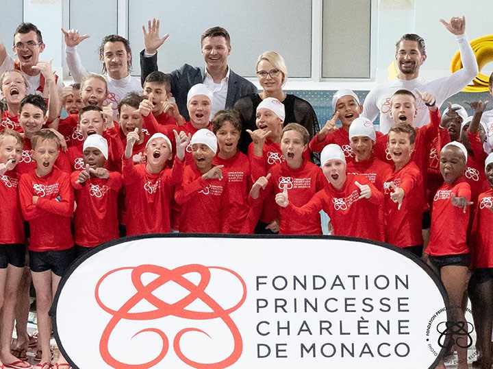 Princess Charlene gives Swimming Workshop to Saint Devote Rugby Players