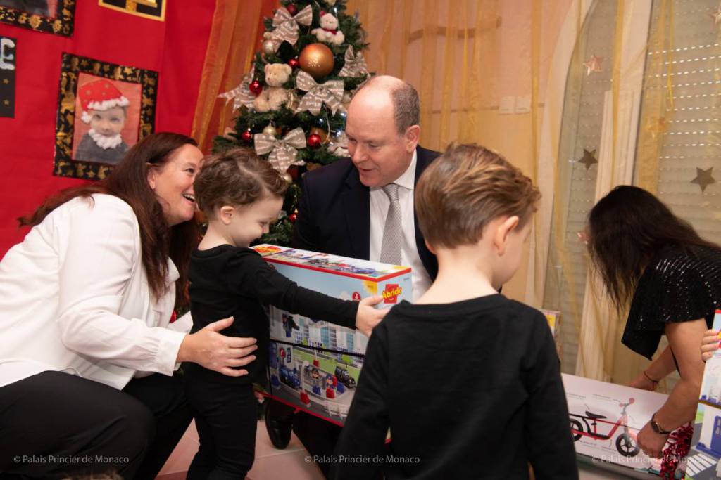 Prince Albert and Princess Charlene give out Red Cross Christmas Gifts