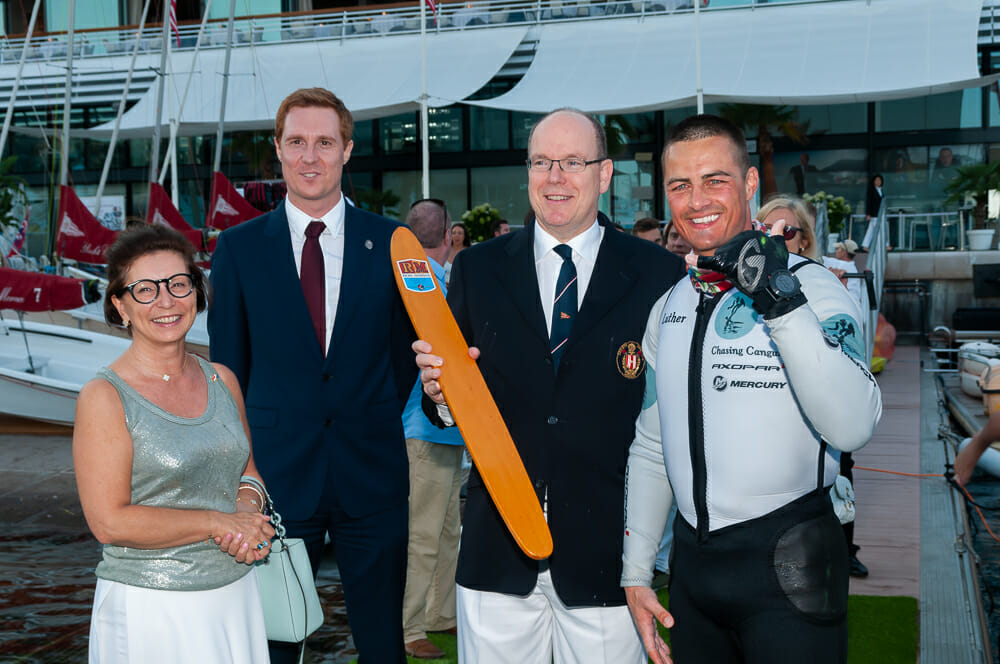 Prince Albert II greets marathon water skier Alex Luther