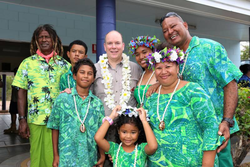 Prince Albert with artist Alick Tipoti on Badu