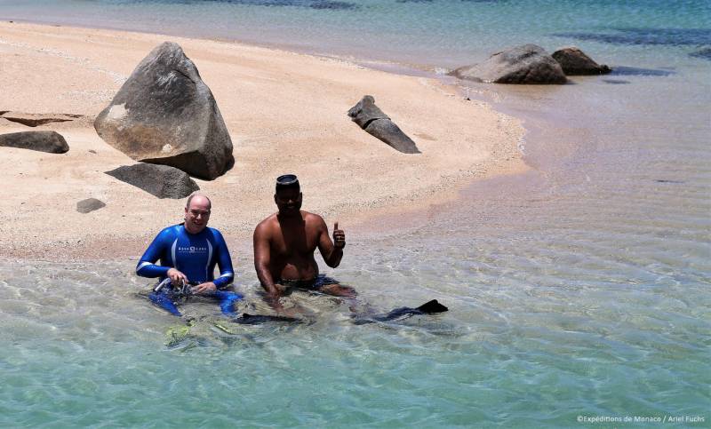 Prince Albert with artist Alick Tipoti on Badu