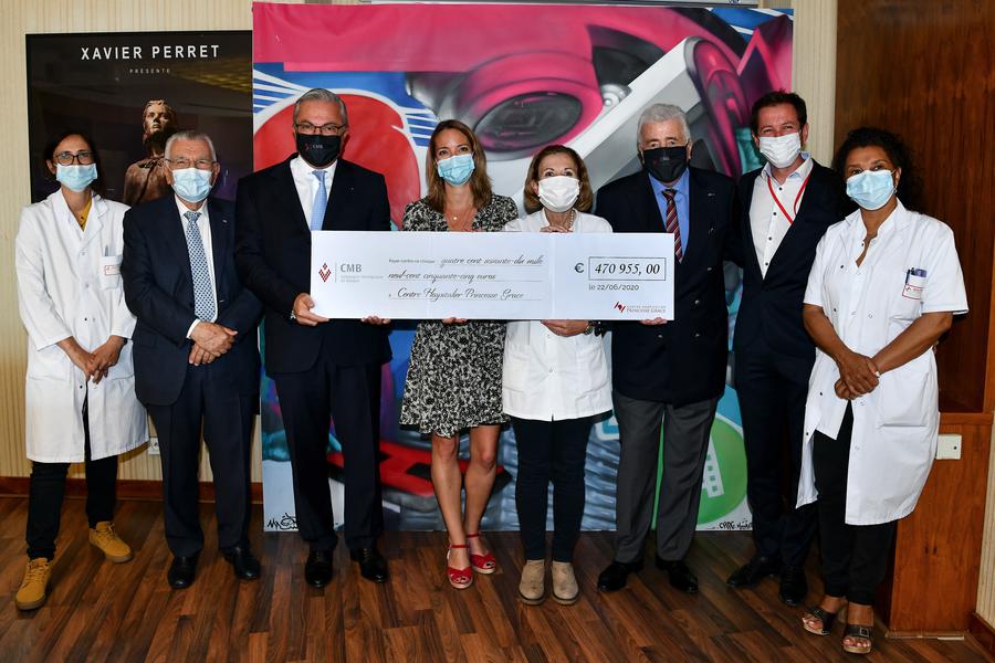 Compagnie Monégasque de Banque presents cheque for €470,955 to Princess Grace Hospital